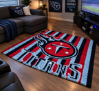 Hand-tufted Tennessee Titans rug in navy, red and light blue with bold vertical stripes and the Titans emblem.