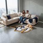 Hand-tufted Nashville Predators rug cut to the saber-tooth mascot shape in navy, gold and white.